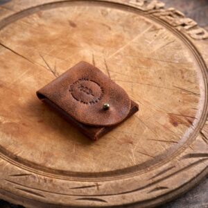 BakeryBits Brown Puck Lame Case Constituted of Reclaimed Leather-based